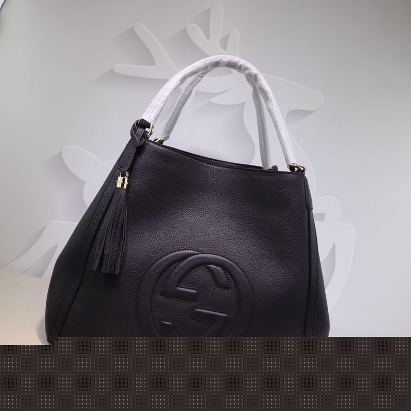 G*u*i top handle bags